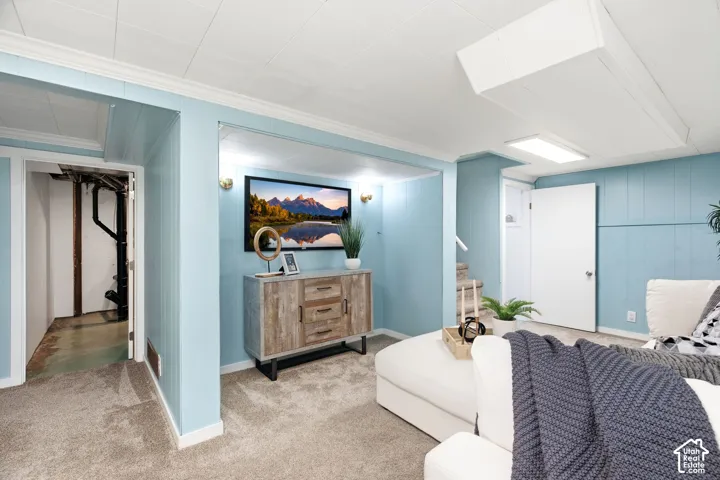 Basement living room-the secret lined storage area is located behind the upper turquoise wall panel.