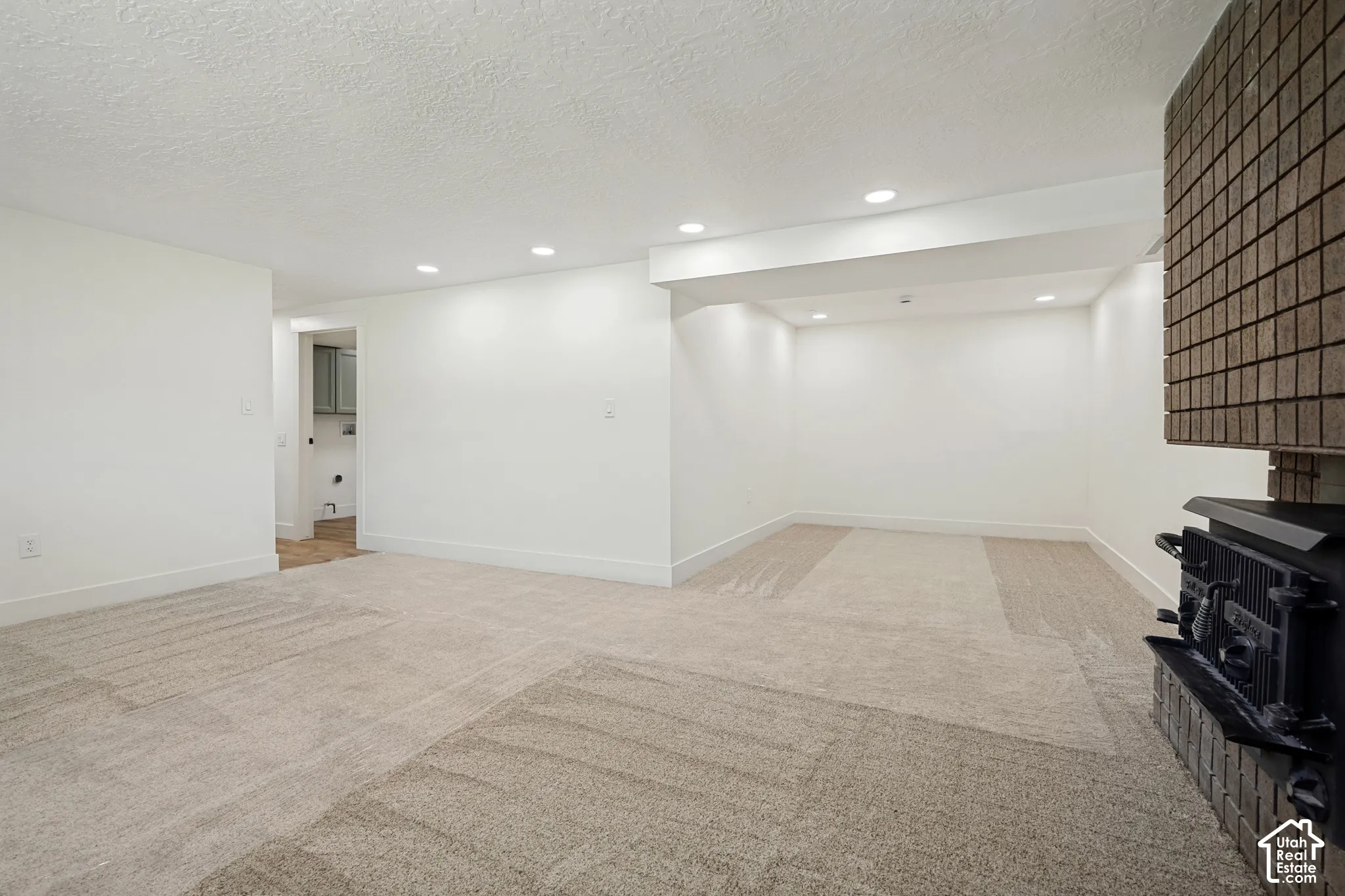 Neutral-toned carpeting throughout