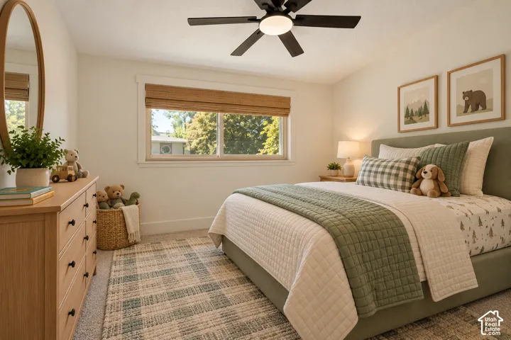White walls with contrasting trim, a window with natural light, and a ceiling fan with integrated lighting