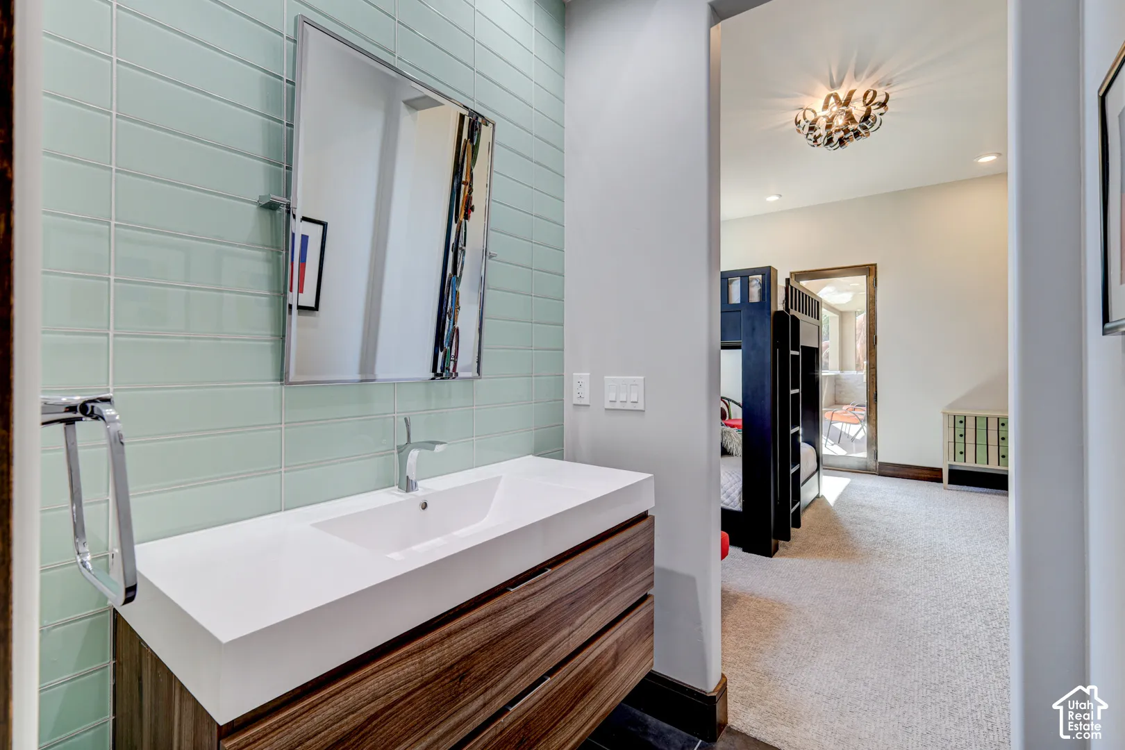 Modern vanity with an integrated sink and wood-finish cabinetry