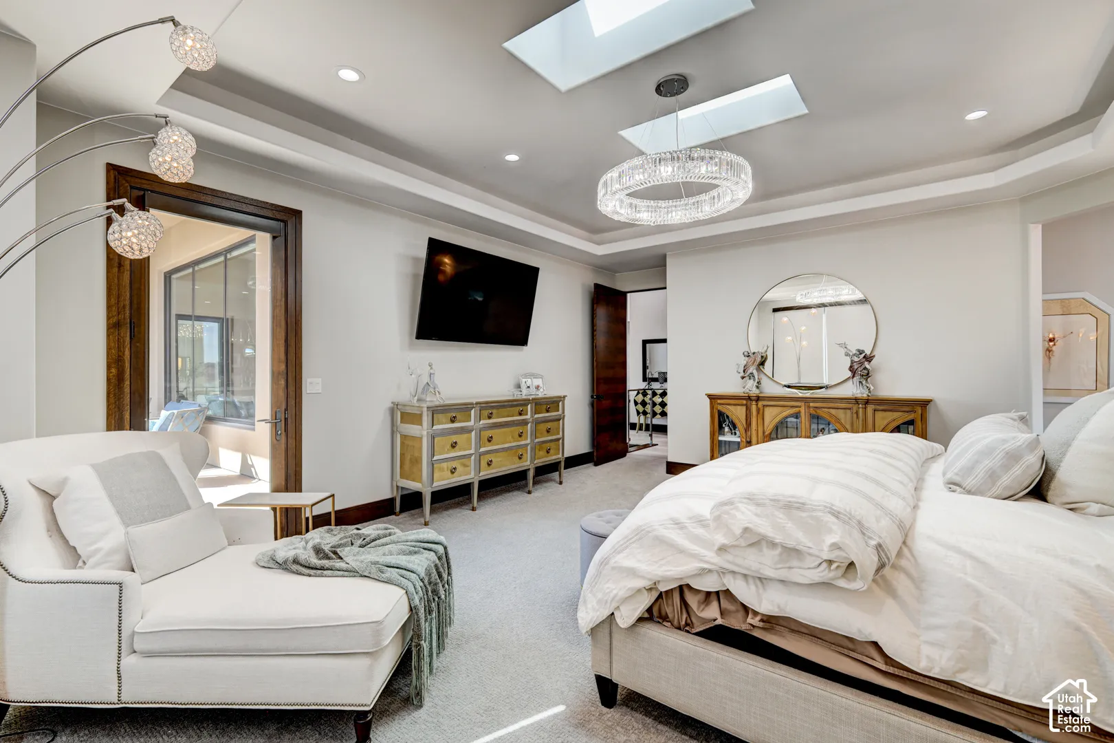 Recessed lighting, skylights, and a tray ceiling