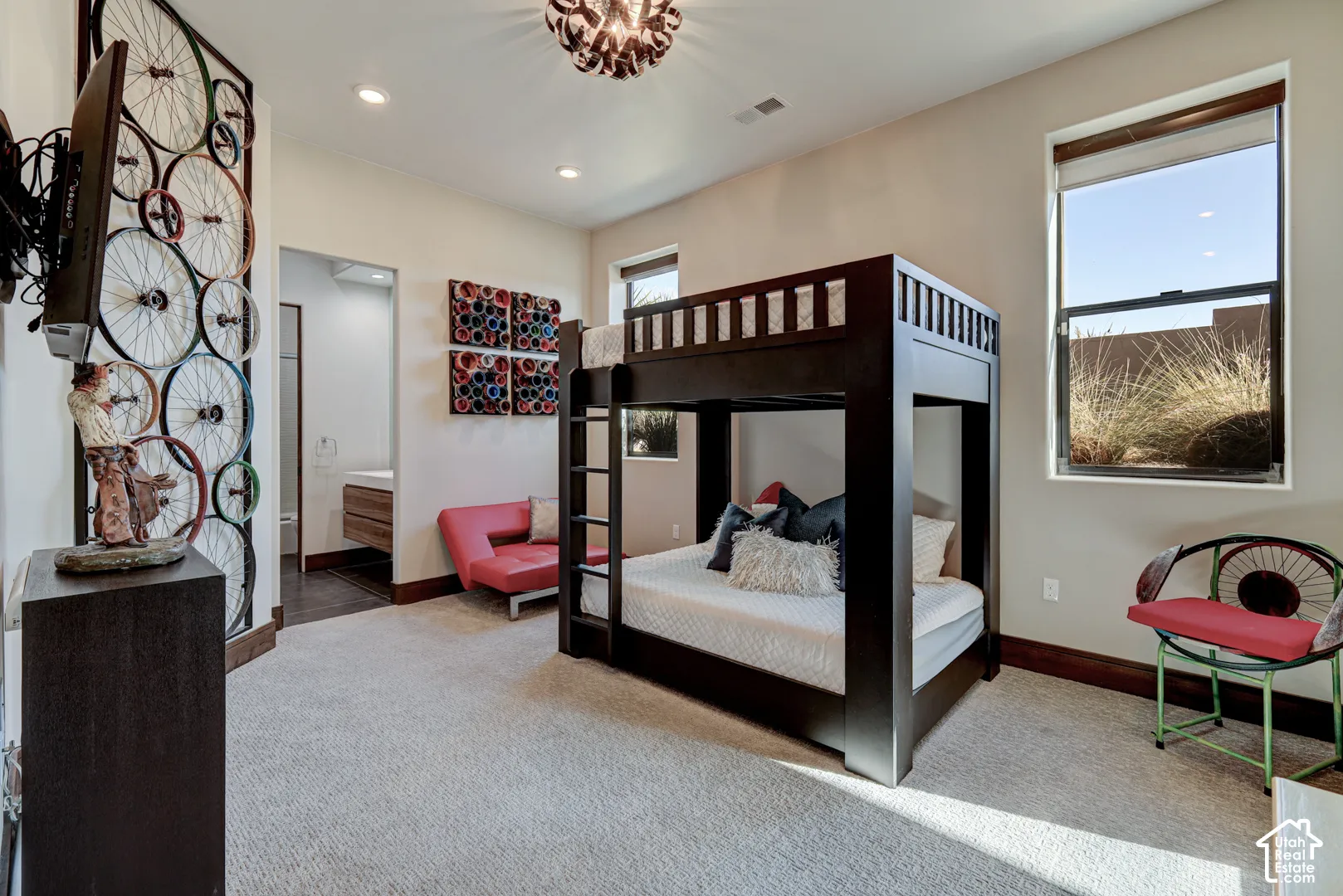 Carpeted room with recessed lighting and a ceiling-mounted fixture