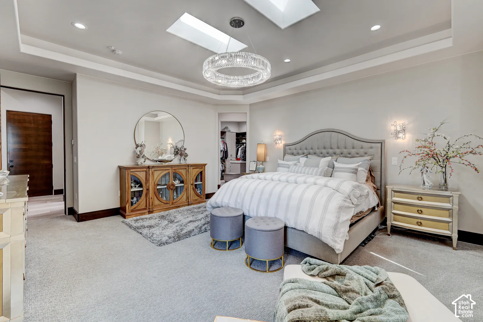 Tray ceiling with recessed lighting and skylights