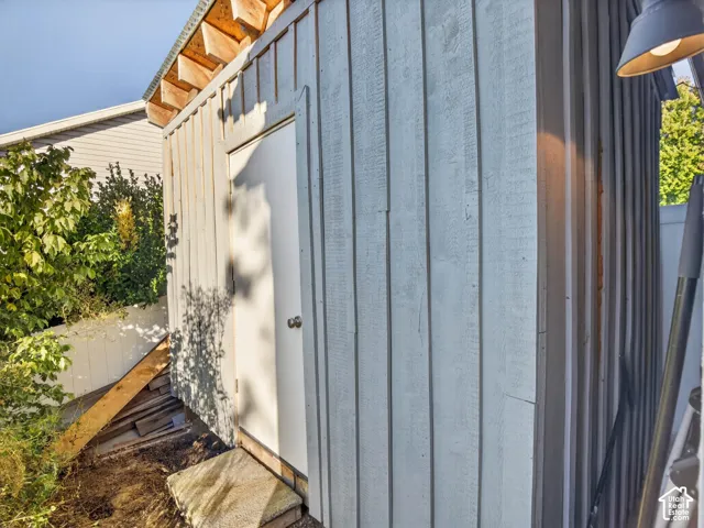 Outdoor shed with side paneling