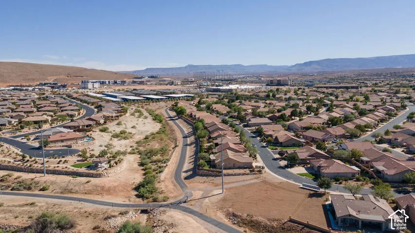 Expansive residential development featuring paved roads and pathways