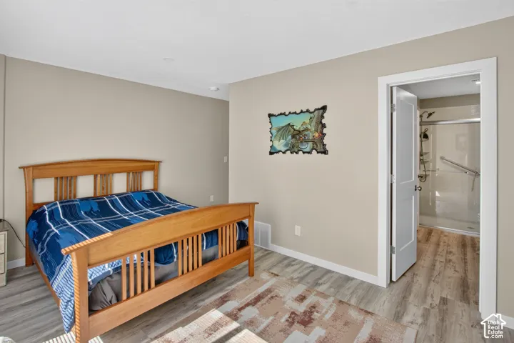 Neutral wall paint and wood-finish flooring