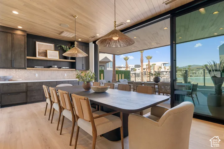 Wood-finish plank flooring and ceiling with recessed lighting