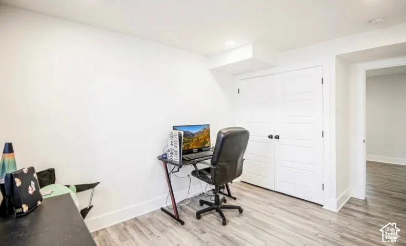 White walls with wood-finish flooring