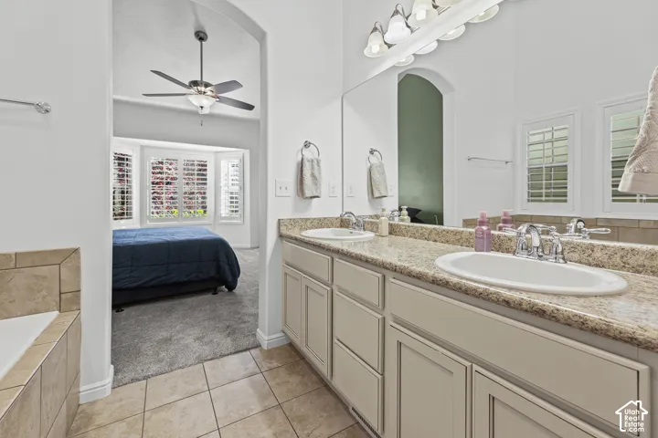 Dual vanity with undermount sinks and light-toned countertops
