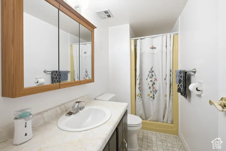 Wood-finish medicine cabinet with integrated mirrors