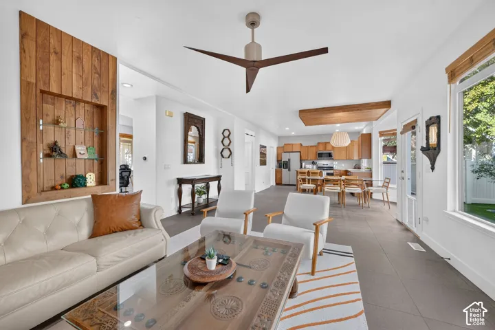 Recessed wall feature with wood paneling and glass shelving