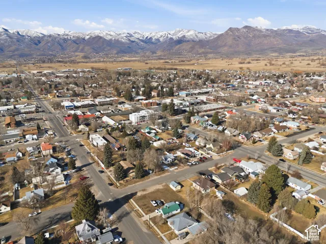 Expansive mountain backdrop with snow-capped peaks