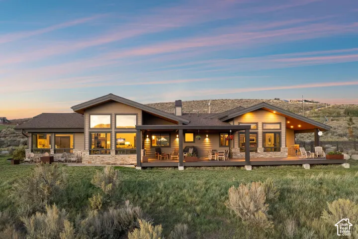 Contemporary exterior featuring horizontal siding and stone accents