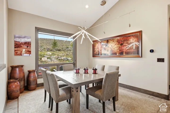Vaulted ceiling with an angular pendant light fixture