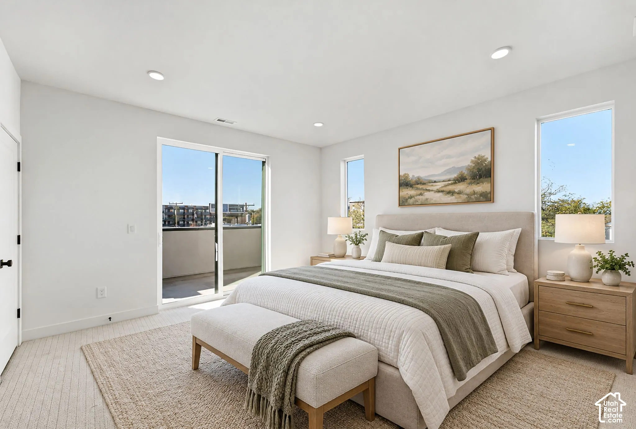 Light-filled bedroom featuring recessed lighting, a sliding glass door to a private balcony, and carpet,