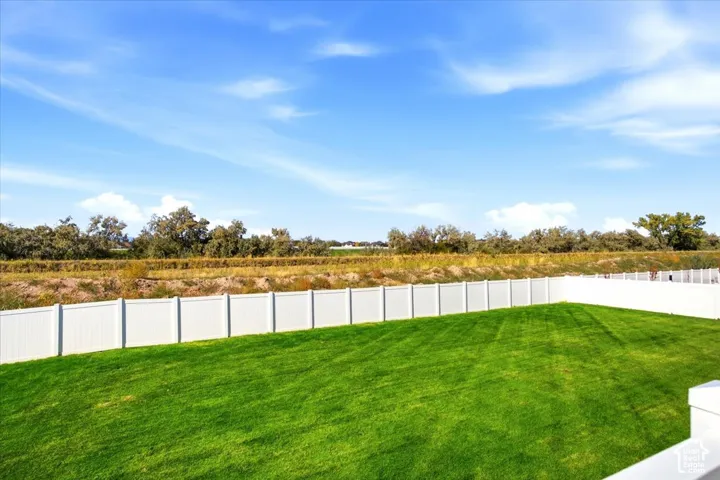 Fully fenced, with no backyard neighbors and views for days!