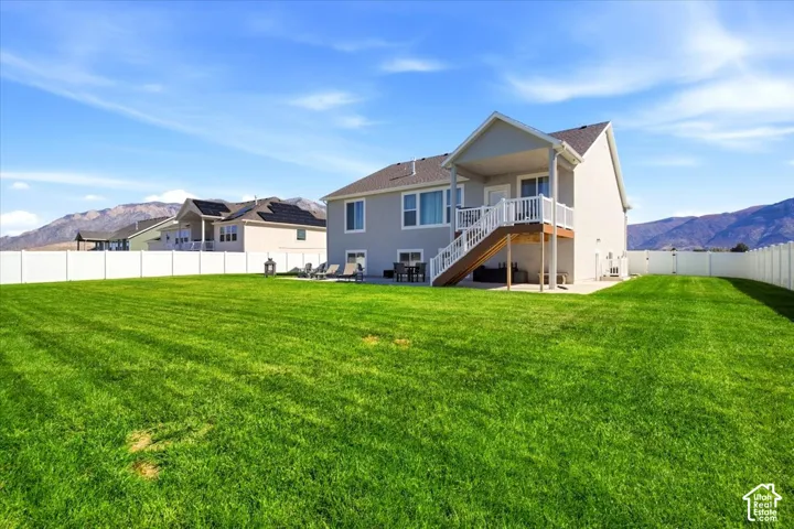 Large fully fenced and gated lot, with the landscaping complete! Gorgeous mountain views!