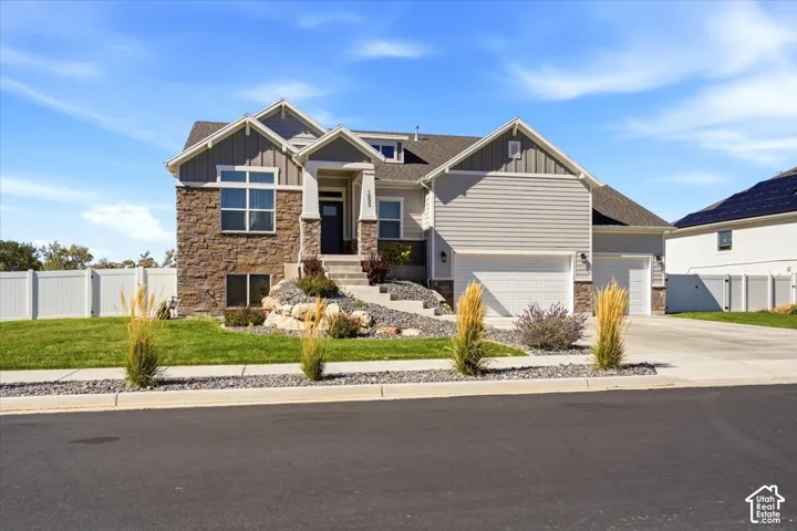 Nearly new rambler on over 1/3 acre with no backyard neighbors, mountain views, and the big projects already complete