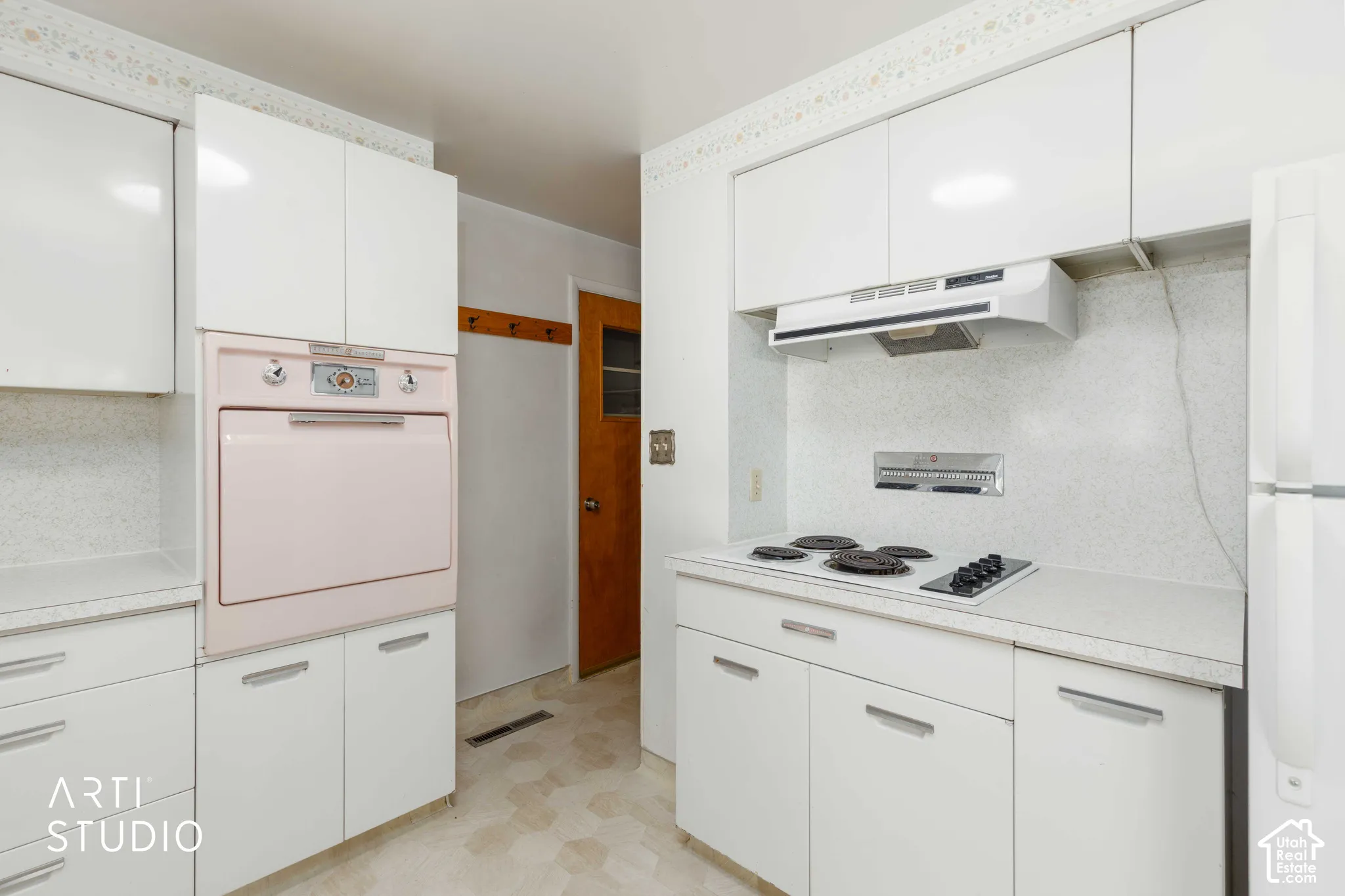 White cabinetry with sleek hardware