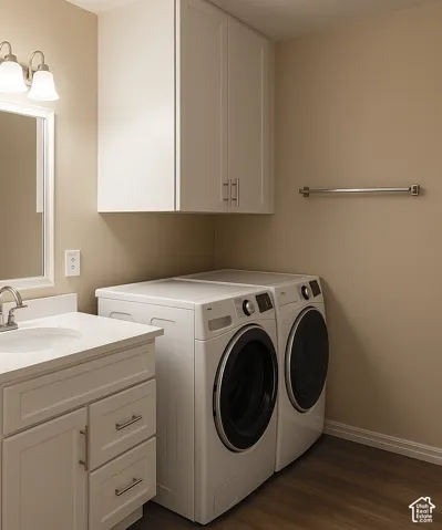 White shaker-style cabinetry with brushed nickel hardware, white vanity with integrated sink, wall-mounted mirror with white frame, and wood-finish flooring