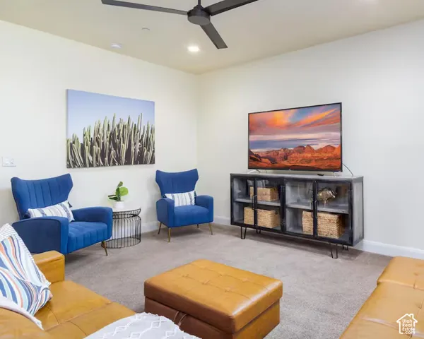 Recessed lighting, ceiling fan, and carpeted flooring
