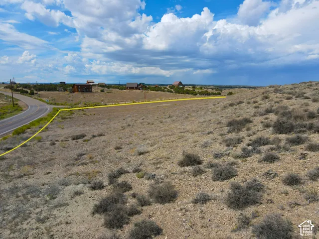 Expansive undeveloped land featuring natural desert vegetation