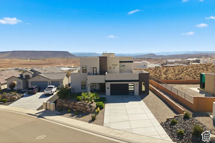 Modern multi-story exterior with a flat roofline