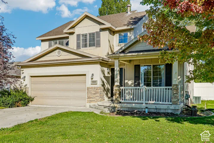 Two-story exterior with horizontal siding and stone accents