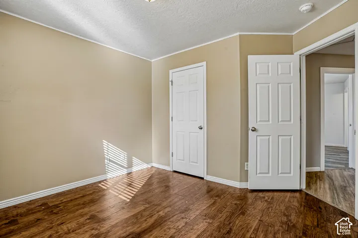 Warm-toned walls complement wood-finish flooring