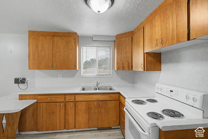 Wood-finish cabinetry paired with light countertops