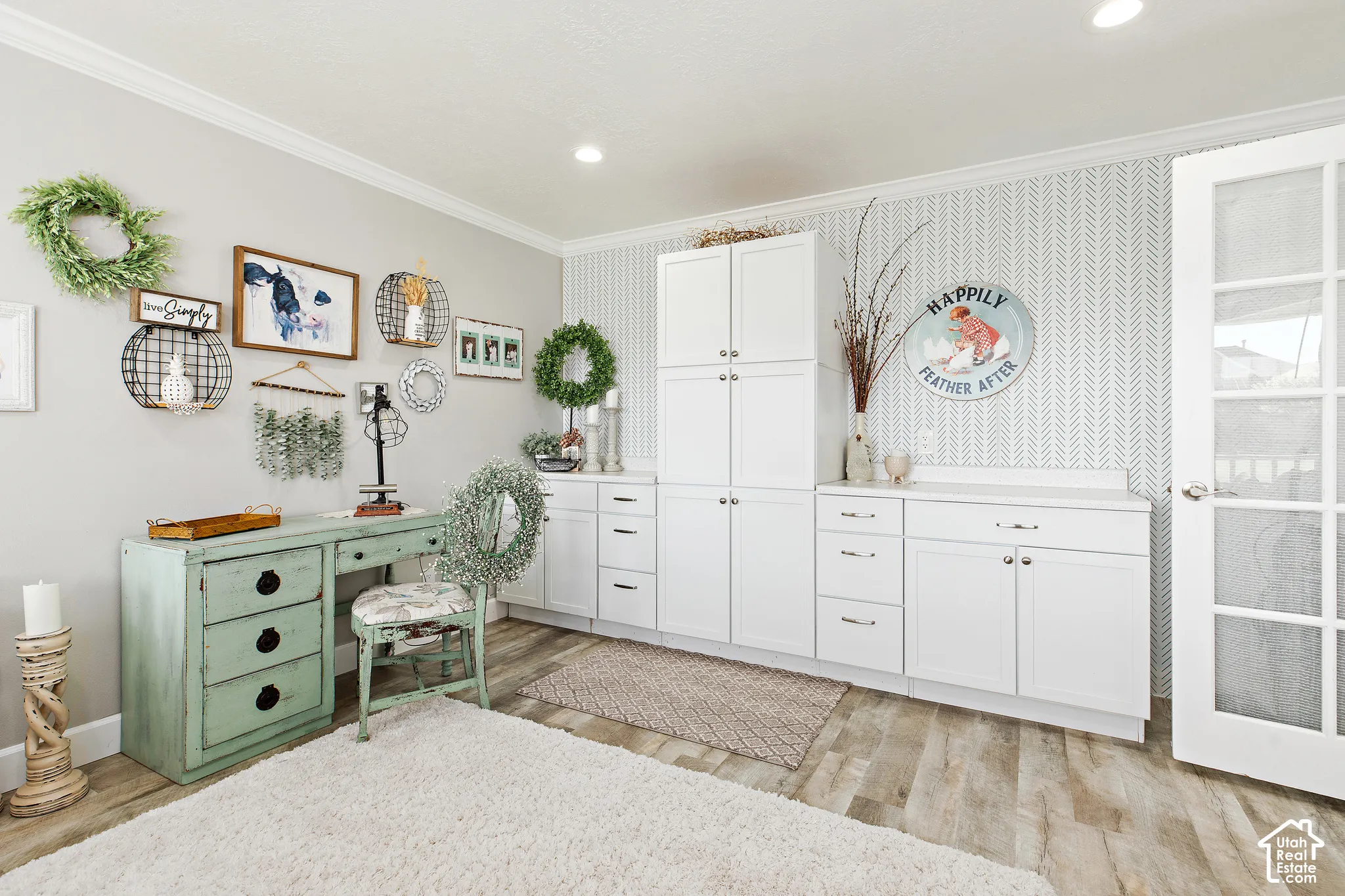 Custom built-in white cabinetry with chrome hardware