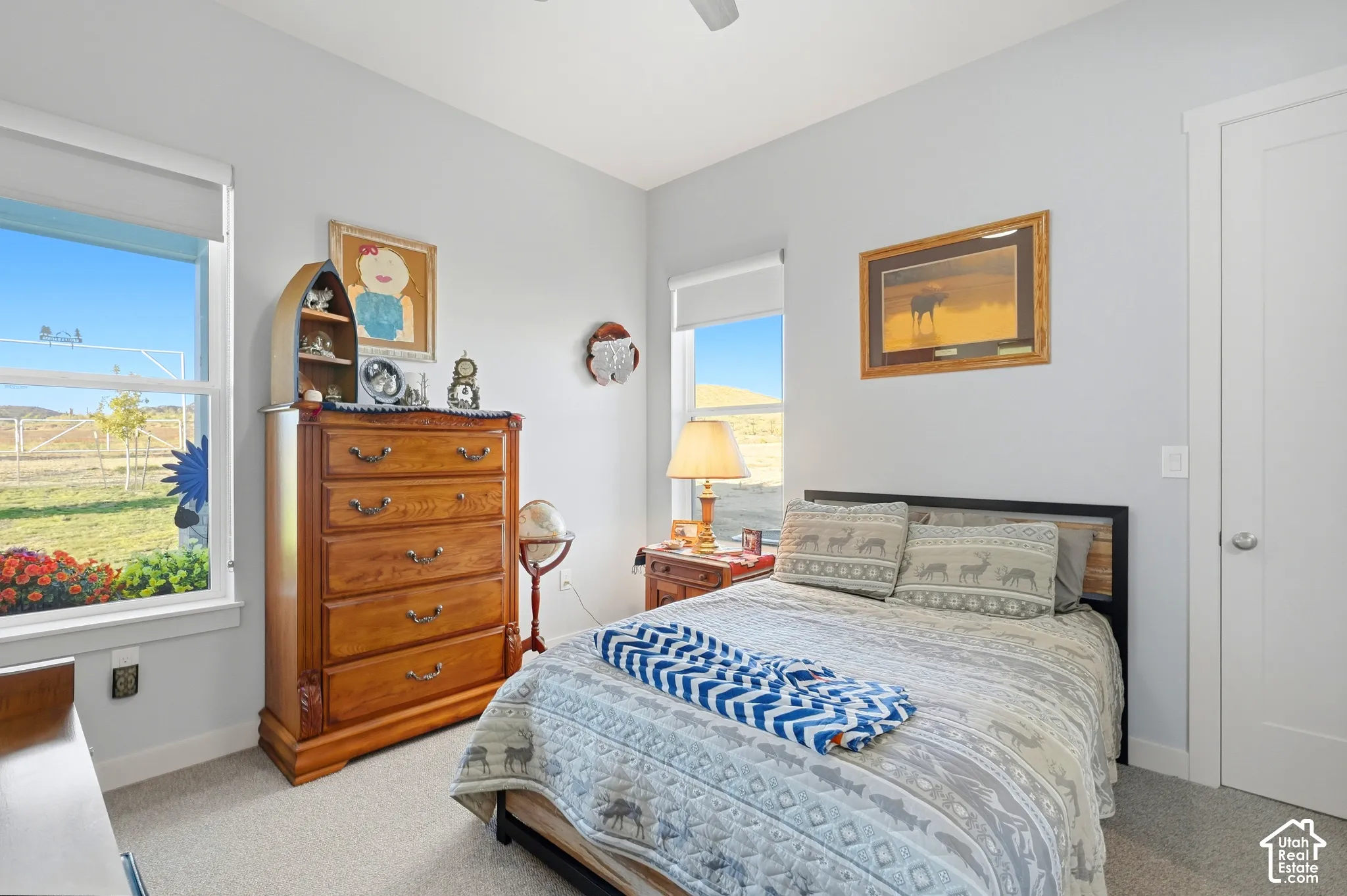 Light gray wall paint, white trim, and a white interior door