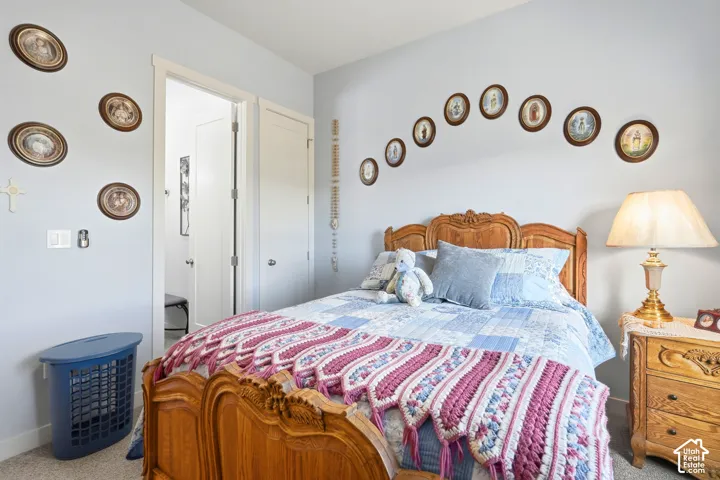 Light gray wall paint, white trim, and a doorway with a white door