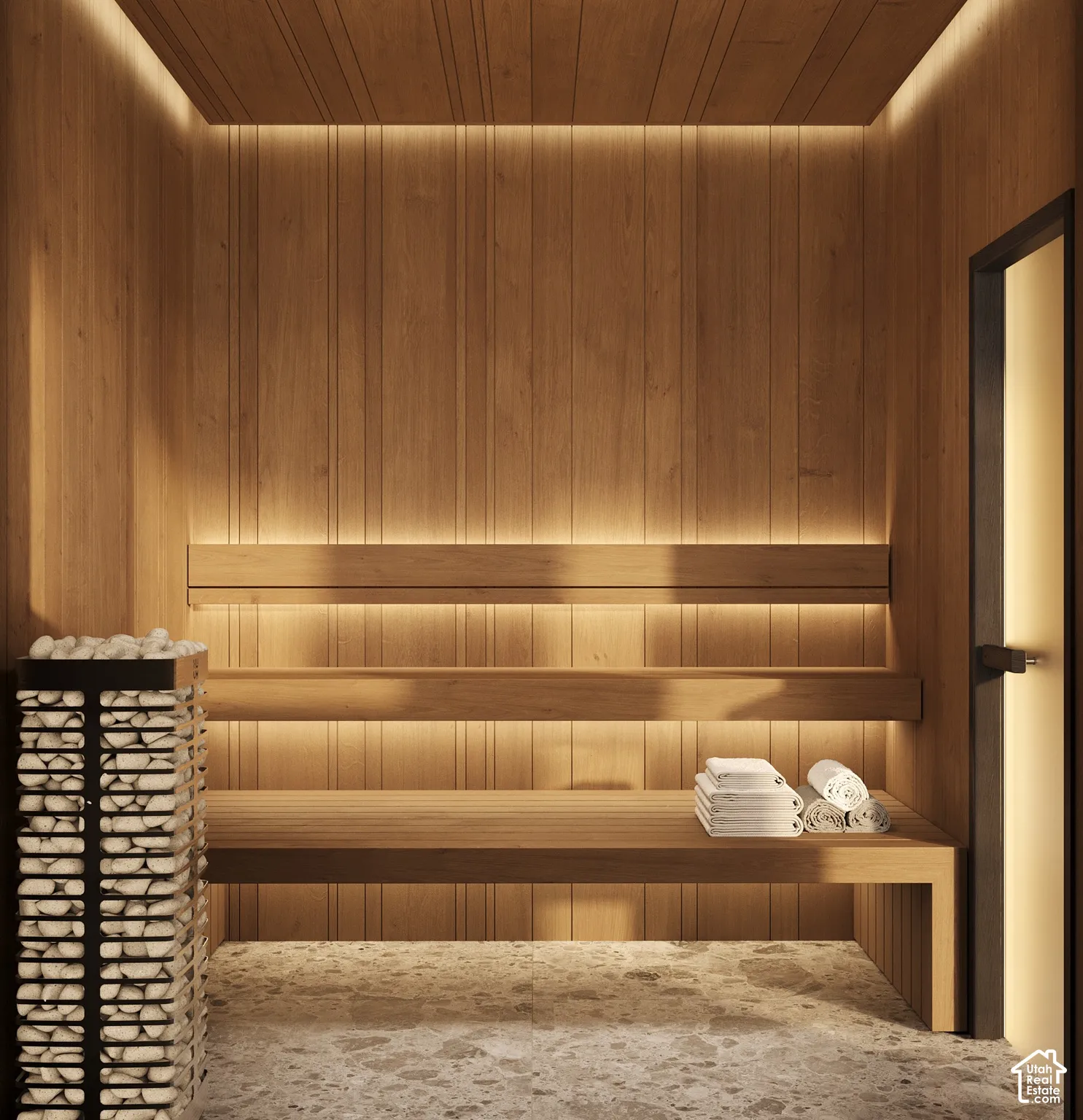 Sauna with wood paneling, integrated bench seating, accent lighting, stone floor, and a built-in sauna heater