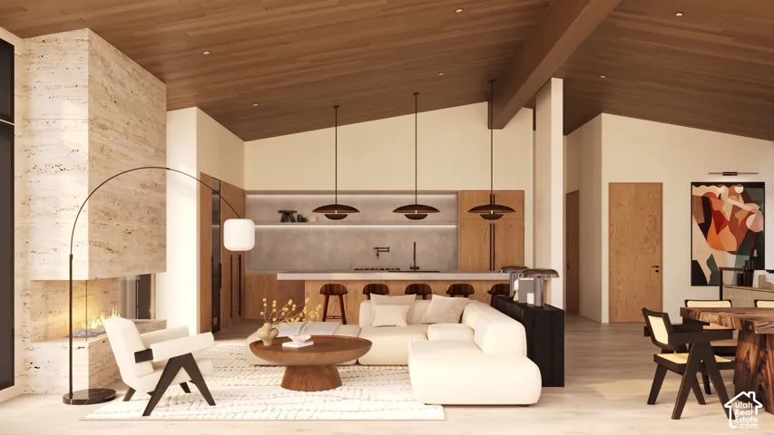 Renderings of Vaulted wood-paneled ceilings with exposed beams, a stone-clad fireplace with an integrated hearth, light wood-finish flooring, a kitchen island with a light-toned countertop, and recessed lighting