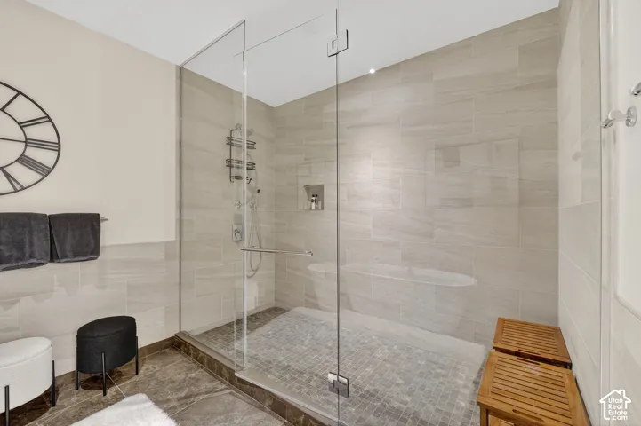 Walk-in shower with clear glass enclosure