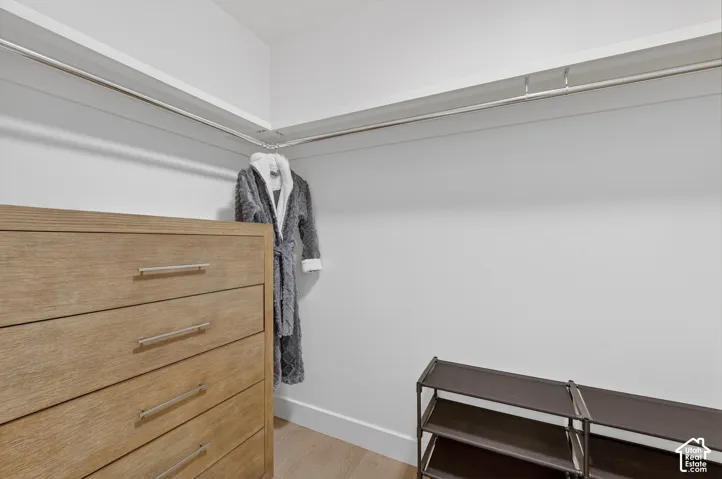 Built-in closet shelving system with hanging rods