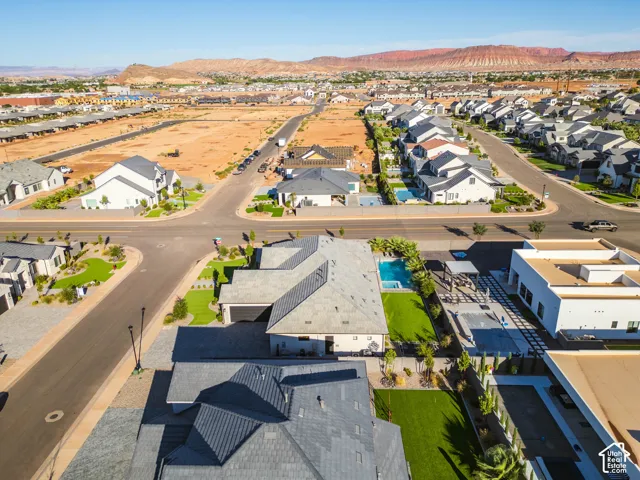 Expansive residential area featuring a mix of completed homes and undeveloped land
