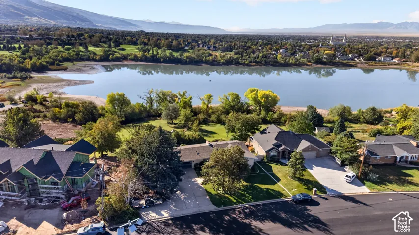 Aerial perspective showcasing a waterfront property