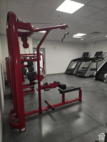 Fitness center with hard surface flooring, recessed lighting, and dedicated exercise equipment