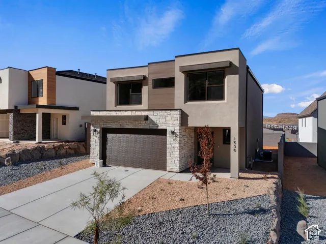 Contemporary exterior with stucco and stone accents