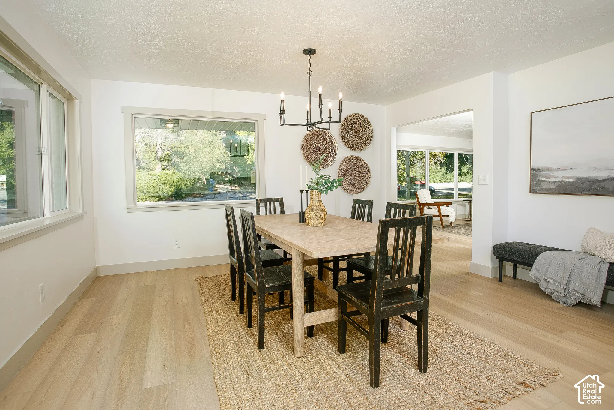 Light wood-finish flooring with a neutral wall color