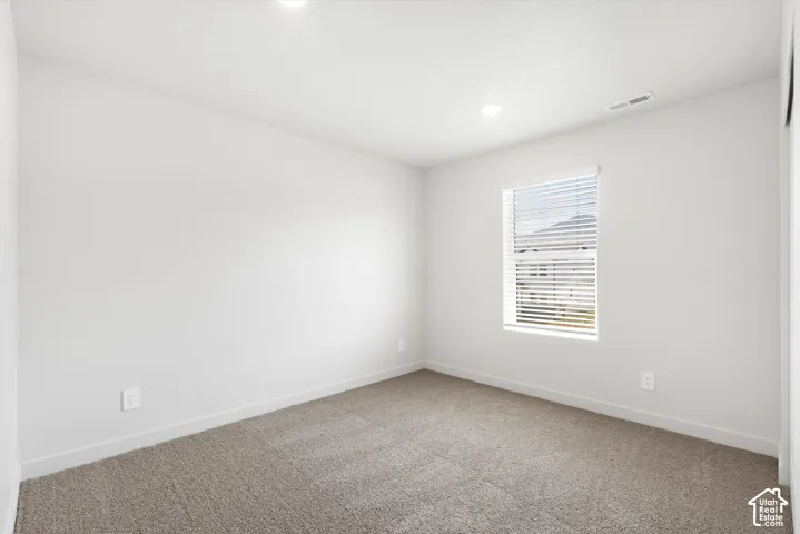 **DICSLAIMER** Interior package may vary.  Recessed lighting, window with blinds, and neutral carpeting