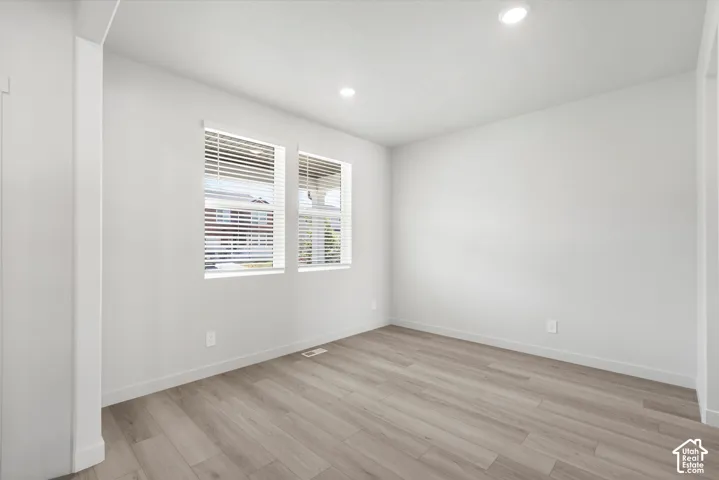 **DICSLAIMER** Interior package may vary.  Recessed lighting, wood-finish flooring, two windows, window blinds, and white wall finishes