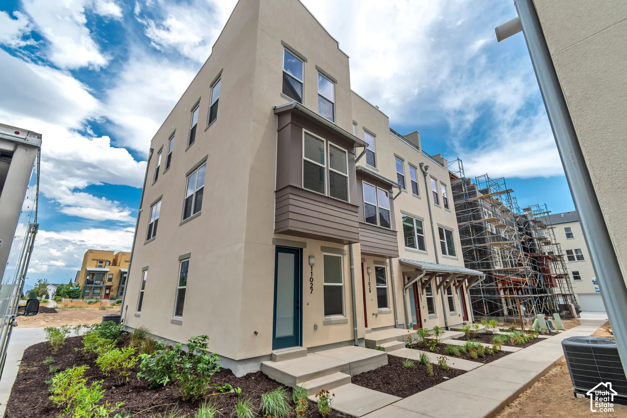 Contemporary multi-story exterior with stucco finish