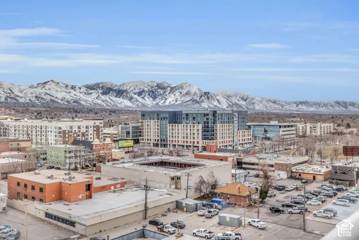Expansive mountain range backdrop and surrounding cityscape