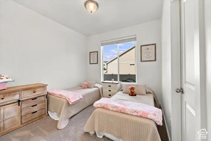 Recessed window with white trim, wall-to-wall carpeting, and a flush mount ceiling light