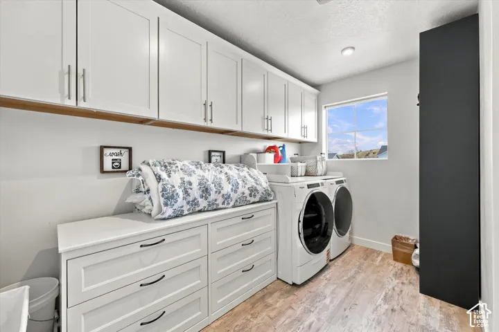 White shaker-style cabinetry with brushed nickel hardware