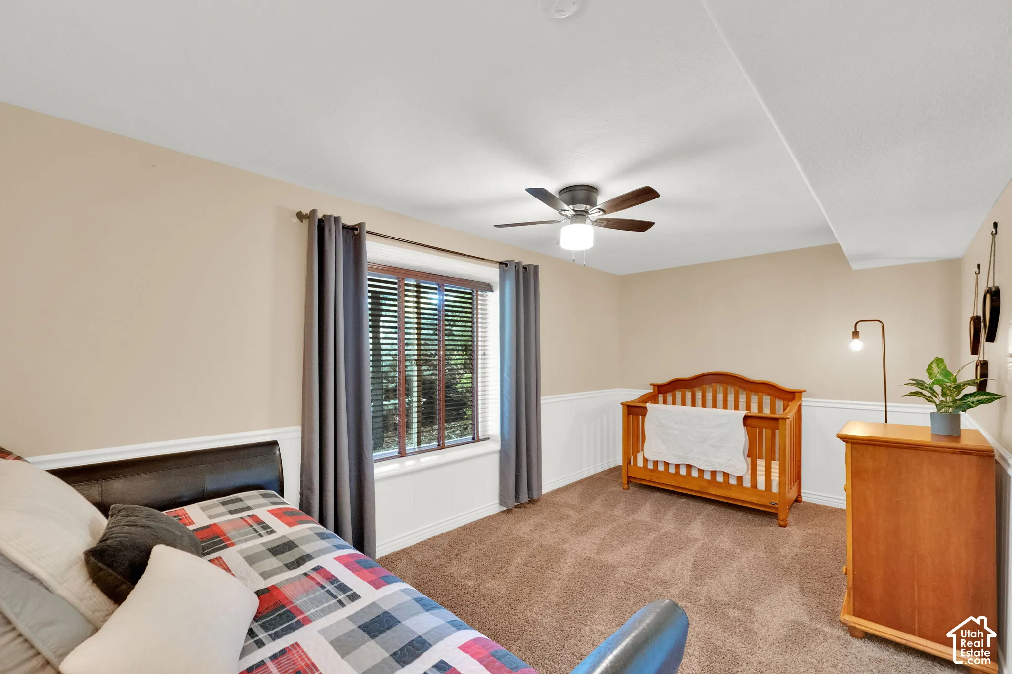 Wall-to-wall carpeting and neutral paint throughout