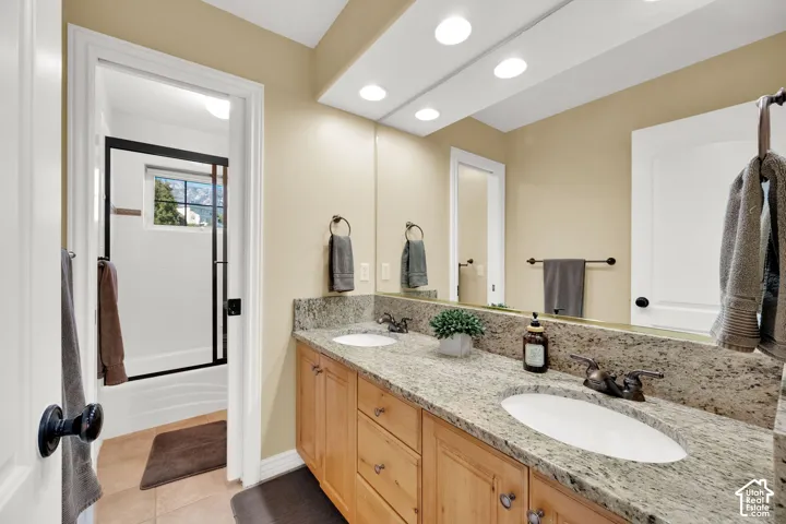 Dual vanity with granite countertops and undermount sinks
